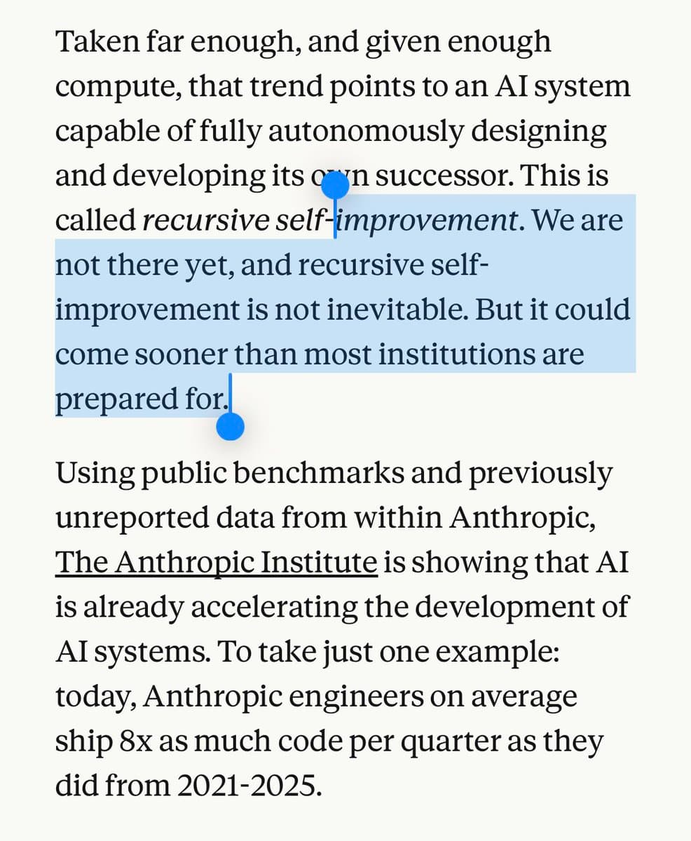 Anthropic engineer reviewing code on dual monitors with Claude AI interface displaying merged code contributions and…